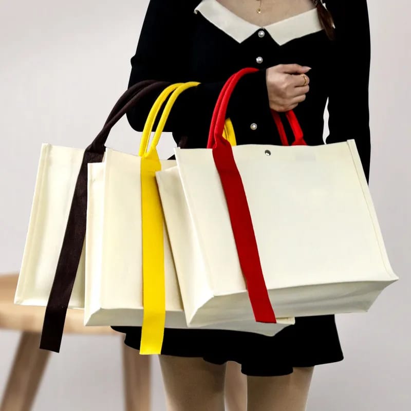 Bolsa en canvas con cinta 14x10.5